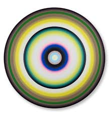 Concentric circles and a central point, representing the quiet act of returning to presence